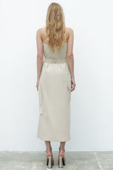 Robe à poches avec taille contrôlée et haut tube